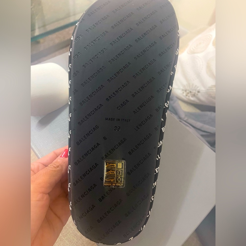 Balenciaga platform slide back and adds a logomania twist on this padded style.
